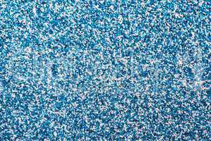 Horizontal vivid blue pebble grainy sand textured abstract backg
