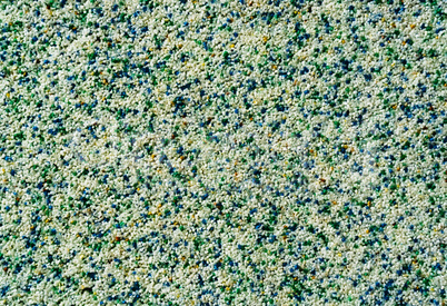 Horizontal vivid white green pebble grainy sand textured abstrac