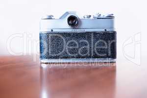 Back view of vintage rangefinder camera background