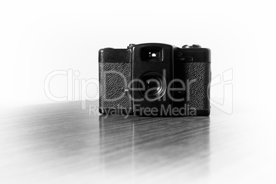 Black and white vintage camera vignette bokeh background