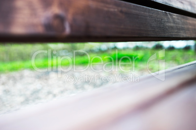 Diagonal park bench bokeh background