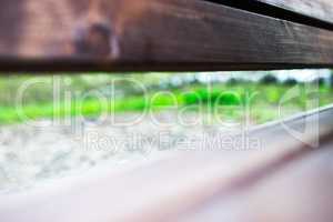 Diagonal park bench bokeh background