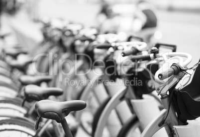 Black and white perspective bicycle row bokeh background