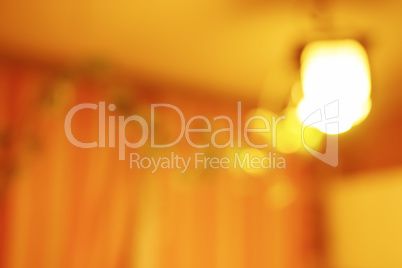 Horizontal vivid orange light lamp bokeh background