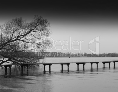 Horizontal bright black and white bridge on river background bac
