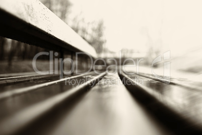 Horizontal sepia bench bokeh background