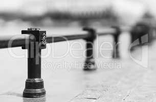 Diagonal black and white fence bokeh background