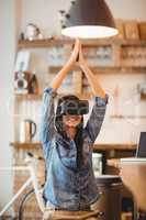 Young woman using the virtual reality headset