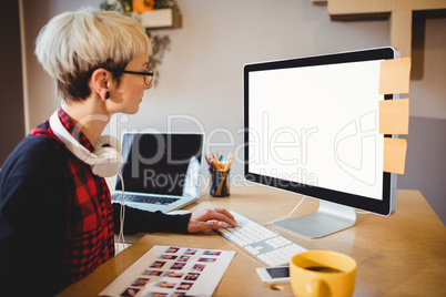 Graphic designer working on computer