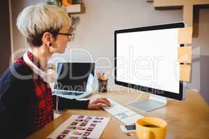 Graphic designer working on computer