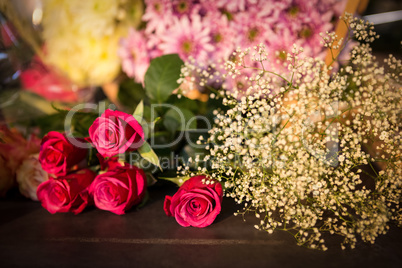 Red roses on table