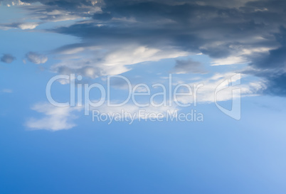 Horizontal top aligned dramatic cloudscape background backdrop