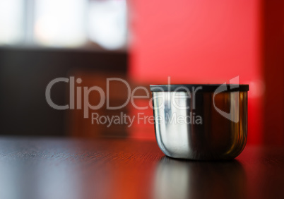 Horizontal cup of hot tea bokeh background