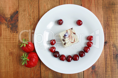 strawberry cherry with cake in shape of smile