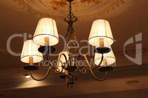 chandelier with romantic standard lamps