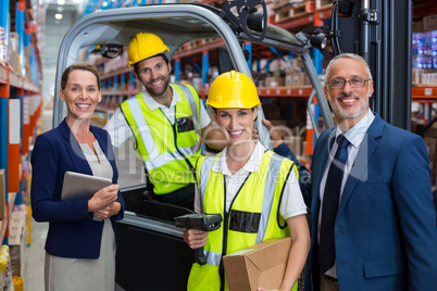 Businessman controlling digital device of worker