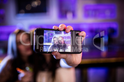 Women talking selfie from mobile phone