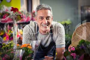 Portrait of happy male florist