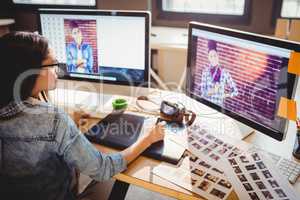 Graphic designer using graphics tablet