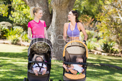 Women standing with the baby stroller