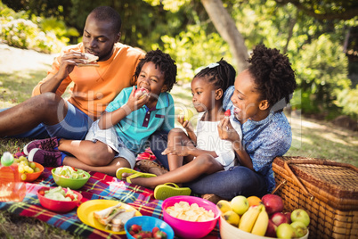 Happy family eating together