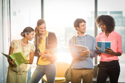 Business people holding files