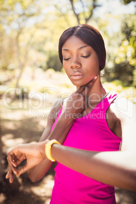 Woman touching her pulsation