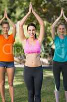 Women practicing yoga