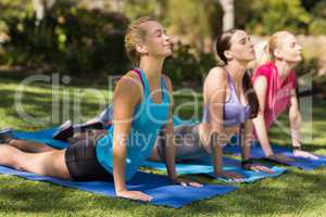Young women doing yoga