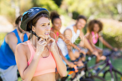 Beautiful woman wearing bicycle helmet