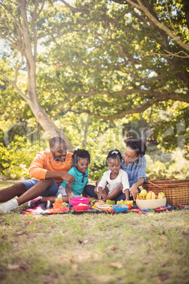 Happy family eating together