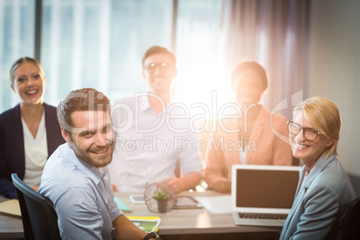 Business people sitting at desk