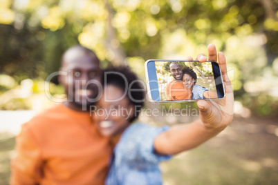 happy couple taking a picture happy couple taking a picture