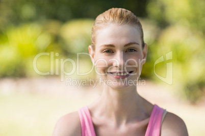 Happy woman in park with a zoom