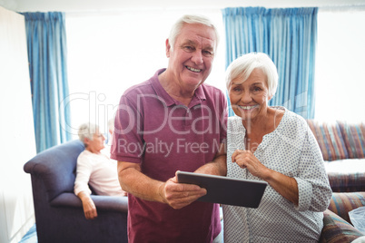 Smiling senior people looking at the camera