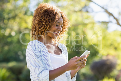 Young woman using mobile phone