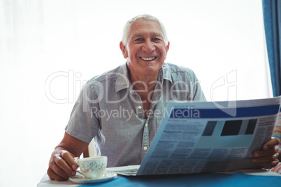 Retired smiling man looking at the camera