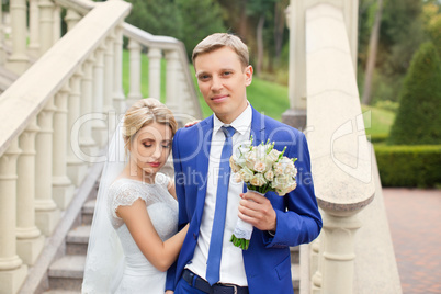 Newlyweds on a walk in the countryside