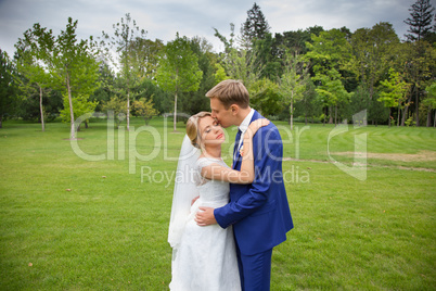 Newlyweds on a walk in the countryside