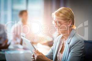 Businesswoman using digital tablet