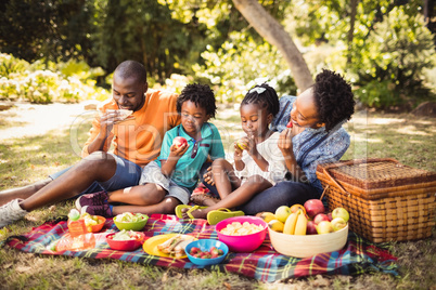 Happy family eating together