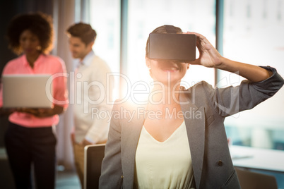 Businesswoman wearing virtual glasses