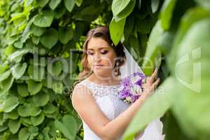 Bride with a wreath on his head, outside the city