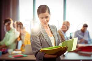 Businesswoman looking at the document