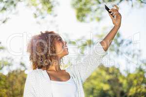 Woman taking a selfie from mobile phone