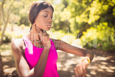 Woman touching her pulsation