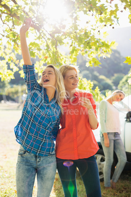 Beautiful women having a fun in park