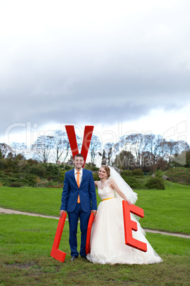 The happy newlyweds on a walk