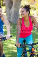 Woman smiling while cycling