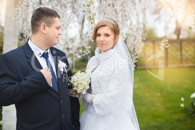 Walking bride and groom in nature